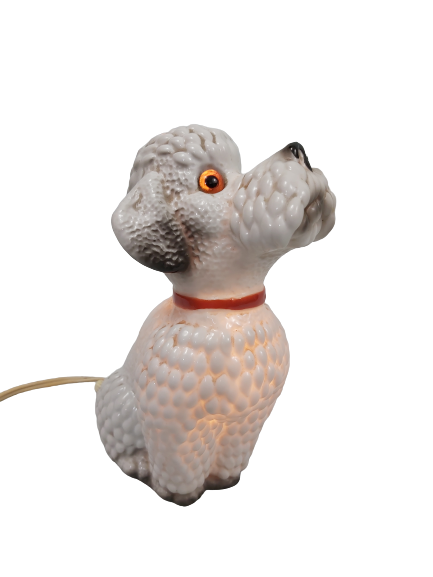 Lampe en faïence caniche.